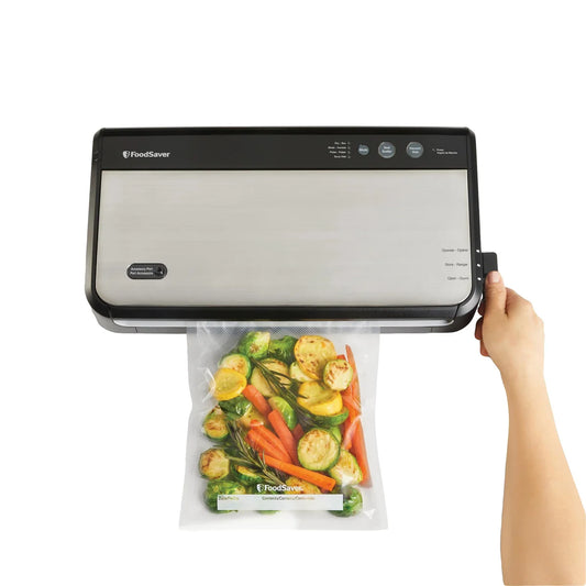 FoodSaver vacuum sealing system with portable sealer attachment