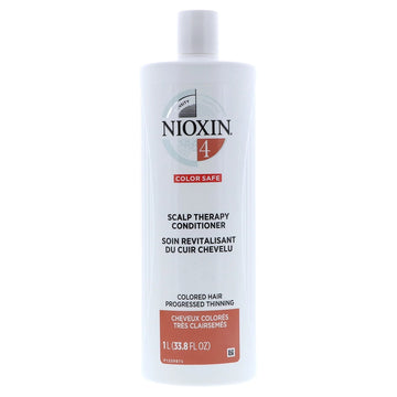 Soin revitalisant capillaire Nioxin System 4 pour cheveux colorés clairsemés.